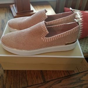 Rose-Gold color. New with original box. Size 9 1/2